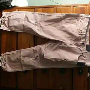 Pink, distressed ankle skimmer jeans